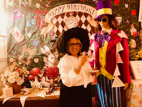 Alice in Wonderland and the Mad Hatter Tea Party.