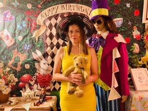 Alice in Wonderland and the Mad Hatter Tea Party.