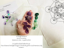 Load image into Gallery viewer, Hand holding crystals with Metatron&#39;s Cube sacred geometry cloth