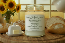 Load image into Gallery viewer, Artisan candle by Karmen’s Tearoom. Farmhouse Kitchen soy wax candle in a clear glass jar with a white label reading 'Farmhouse Kitchen' and a URL, placed on a wooden table with bread loaves, sunflowers, and a white teapot in a warm kitchen setting.