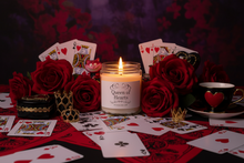 Load image into Gallery viewer, Candle in a glass jar with a label reading 'Queen of Hearts' on a light background